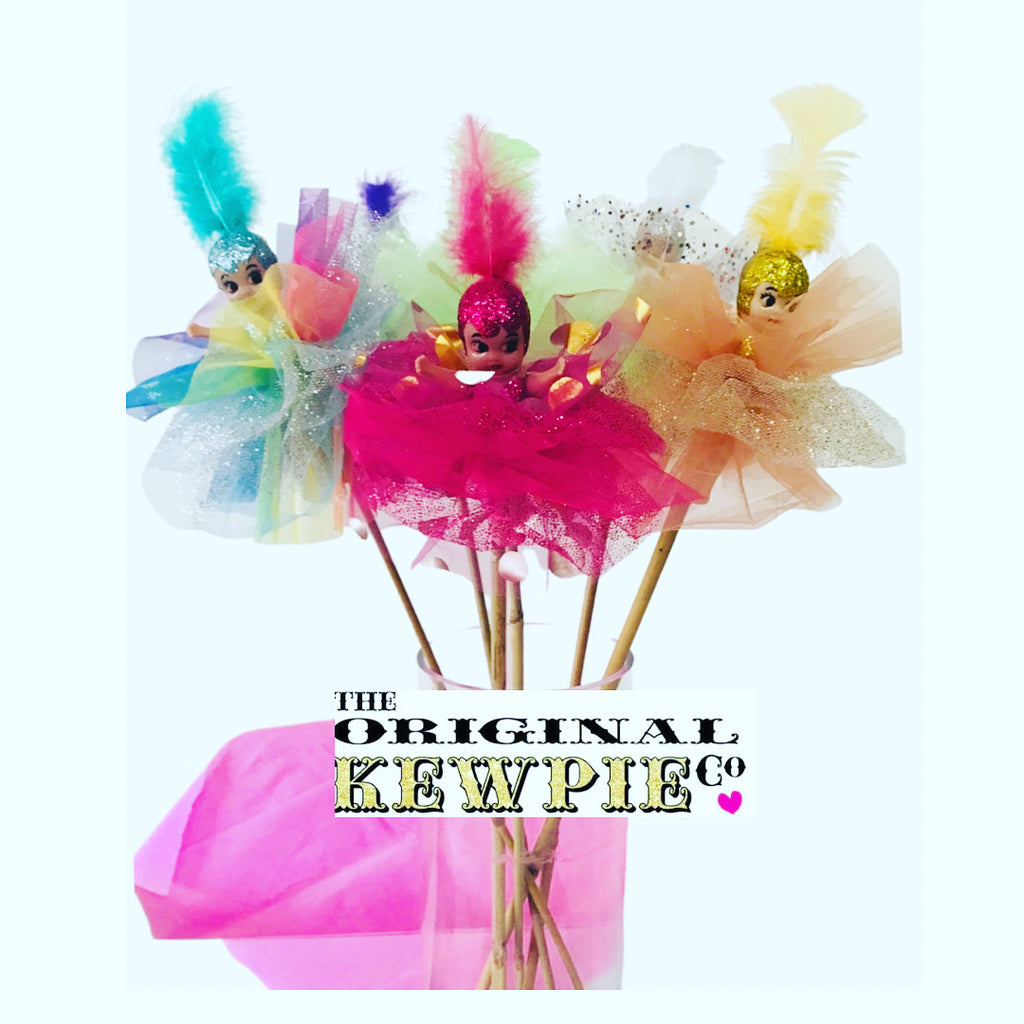 Mixed bunch of 6 bright coloured kewpies on a stick